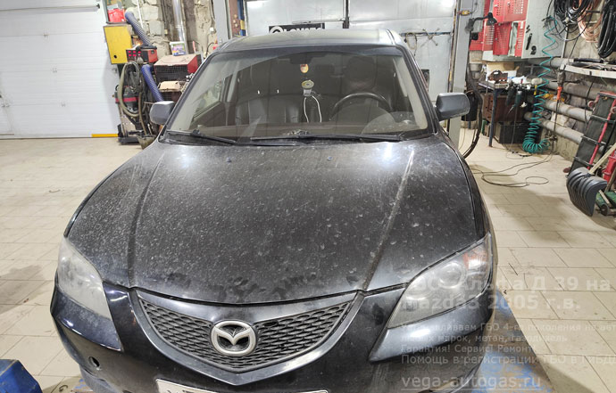 установка ГБО Альфа D39 на Мазда 3 2005 г.в., 1.8 л, 105 л.с., с пробегом 311 327 км., миниВЗУ в лючке бензобака, цилиндрический баллон 54 литра в багажнике, за задним рядом сидений, Нижний Новгород, Дзержинск